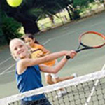 Kid playing tennis